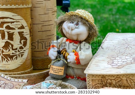 GOMEL, BELARUS - MAY 22, 2015: Outdoor event City of Masters. Exhibition and sale of products from birch bark and toys souvenirs