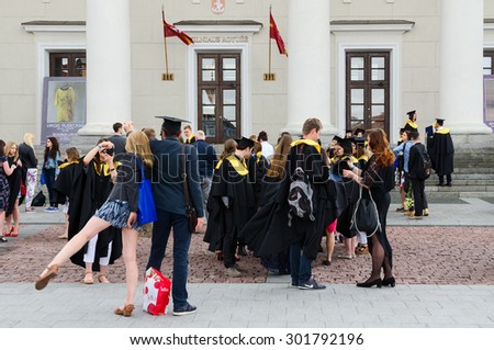 VILNIUS, LITHUANIA - JULY 10, 2015: Graduates of the European Humanities University after the official graduation ceremony near the Town Hall, Vilnius, Lithuania