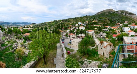 BAR, MONTENEGRO - SEPTEMBER 24, 2015: Panoramic view from the fortress wall of the city Bar in the foothills, Montenegro