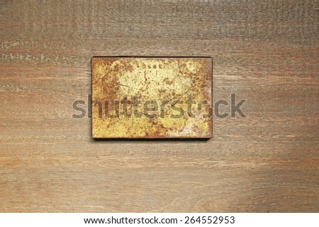 old steel metal box on wooden table