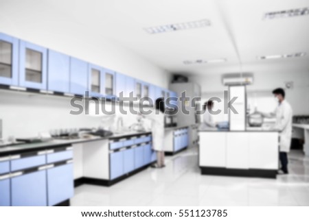 Young laboratory assistant prepare instrument for chemical lab experiment in Lab