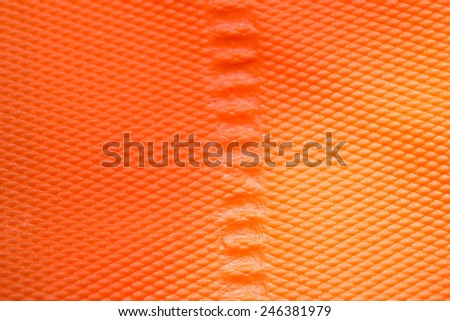orange plastic background / orange background