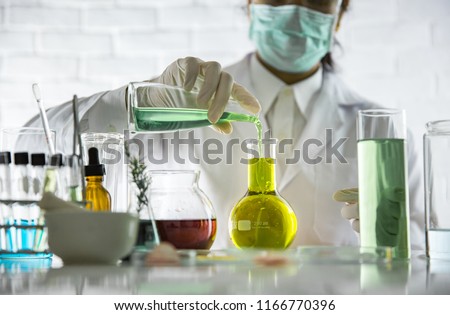 Beauty background, scientist is sampling a chemical extract from organic natural, research and develop background, Scientific concept is sample project about herbal medicine for health & beauty care.