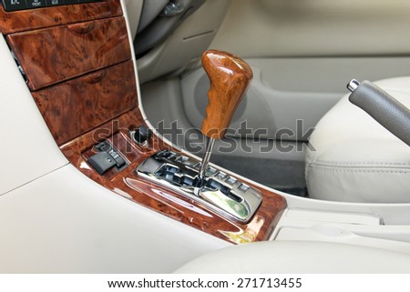 Car interior decorate wood. Automatic transmission gear shift.