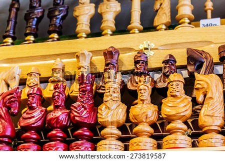 Close-up, detailed images of various chess pieces, queen, king, pawns on sale in the shop
