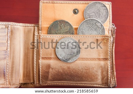ancient coins in purse