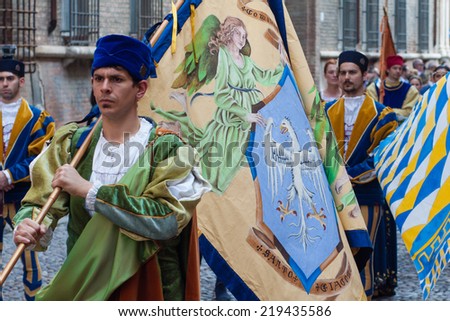 Ferrara, Italy - June 01 2014: The historic center of Ferrara, Italy, June 1, 2014, a reenactment with the ancient medieval clothes of the districts of the city