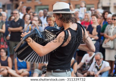 FERRARA, Italy - August 29, 2015: Buskers Festival 2015 in Ferrara, Emilia Romagna, Italy. Busker Festival is a popular event with street artists which is held annually in the center of Ferrara