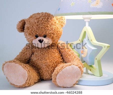 plush bear and night lamp
