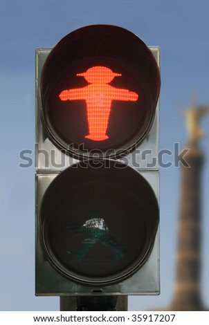 East German Traffic Light. Red. With the Siegesaule in the background.