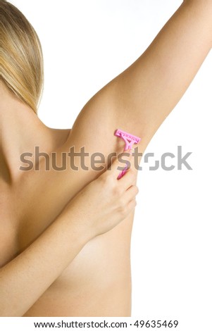 Woman shaving armpit