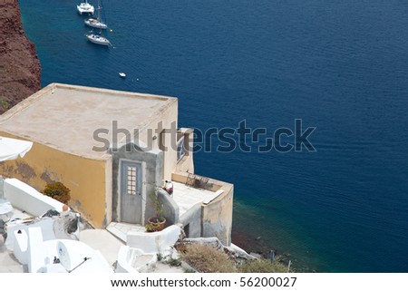 Santorini beautiful volcanic island in Greece landscape with blue churches, windmills and volcanic caldera