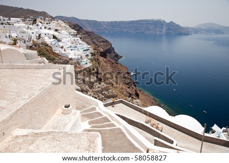 Santorini beautiful volcanic island in Greece landscape with blue churches, windmills and volcanic caldera