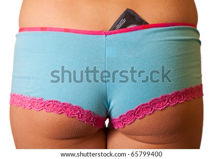 stock photo Closeup of woman panties with condom