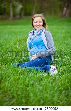 Pregnant woman outdoor spring time