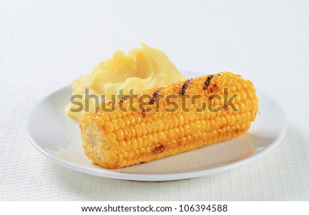 Dish of grilled  sweet corn with mashed potato