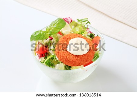 Vegetarian patty with mayonnaise and fresh leaf salad