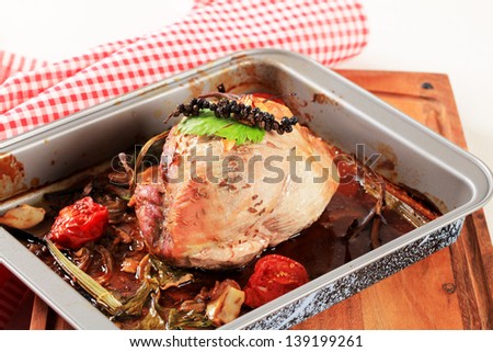 Pork shoulder roasted with vegetables