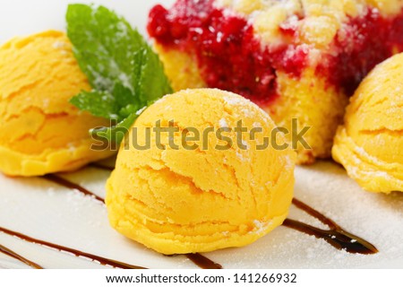Sponge cake with fresh apricot ice cream and sweet sauce