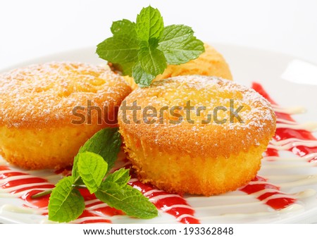 Custard filled muffins with scoop of ice cream