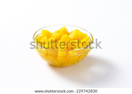 Canned pineapple in a glass bowl