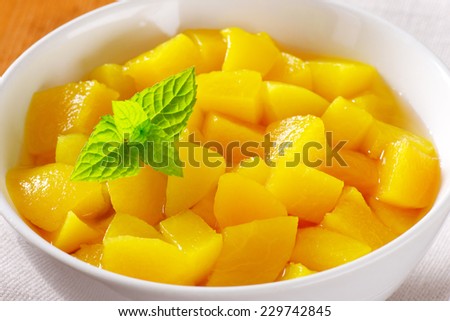 Canned pineapple in a porcelain bowl