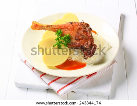 Roast duck leg with potato dumplings and sauerkraut