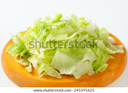Iceberg lettuce salad on cutting board