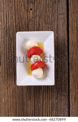 Marinated mozzarella cheese and tomato