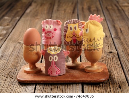 Funny animal egg cosies for boiled eggs