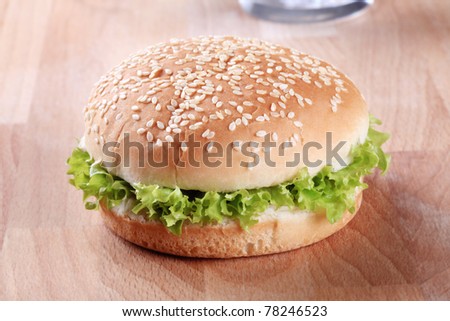 Sesame seed bun with fresh lettuce