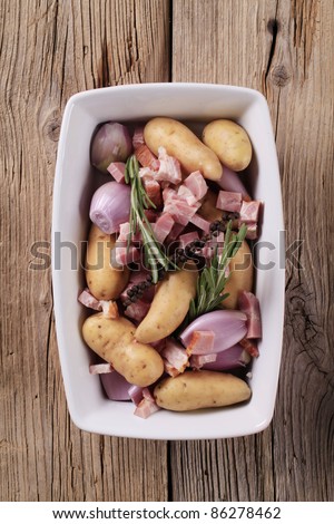 Raw potatoes, Spanish onion and diced bacon