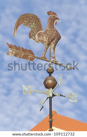 Weather Vane mad of pressed copper depicting a Rooster