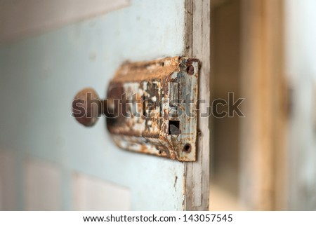 Detail of interior doorknob and lock on house door