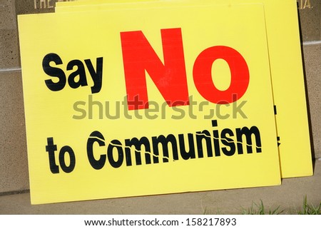 Yellow protest sign, Say No to Communism