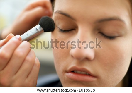 Female having make up applied in Beauty Salon