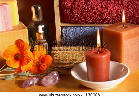 Still life of beauty treatment items with Aromatherapy Candles, Crystals and Soaps