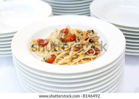 Seaffod pasta dish with crab meat and tomato