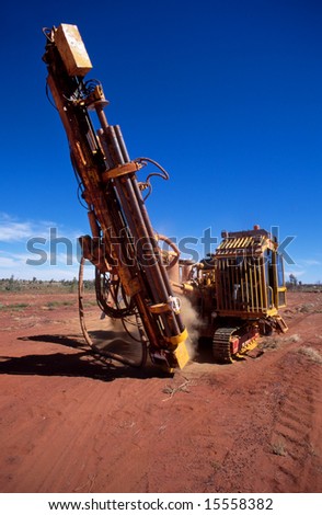 A mobile drilling rig, drilling core samples on a gold mining lease