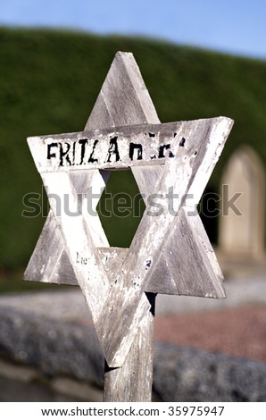 Star of David grave marker made of timber in Jewish section of Cemetery