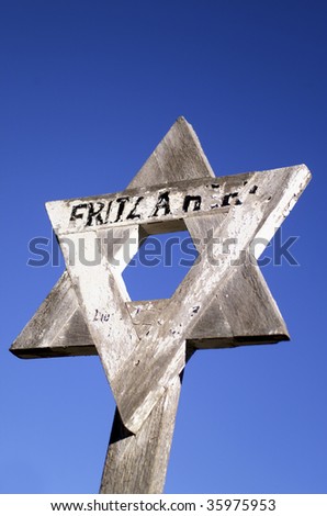 Star of David grave marker made of timber in Jewish section of Cemetery