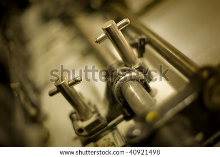 Detail of ancient old printing press with shallow depth of field