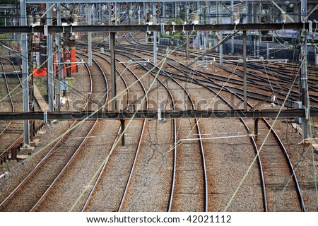 Detail of rail tracks and overhead electricity supply in Railway Yard