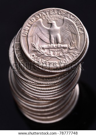 A small stack of US quarter dollar coins