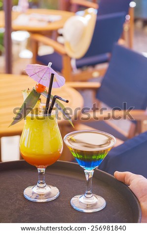 Fancy Alcohol Cocktail Drinks on a bar serving tray