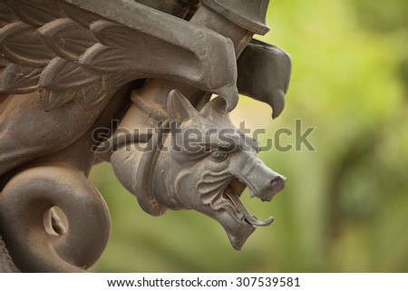 Close up detail of animal head of a metal sculpture, Barcelona