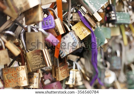 Paris, France-May 15, 2013. Thousands of padlocks known as love locks adorn the  Pont des Arts bridge that spans the Seine River in Paris, France