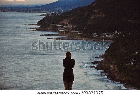 Standing figure facing the shore, New South Wales, Australia