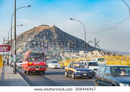 16 Apr 2015 : Lima dowtown with house on hill and movement of car to main land, Lima, Peru