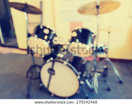 Abstract blurred  music instruments in empty  recording studio  for background. Vintage style photo.